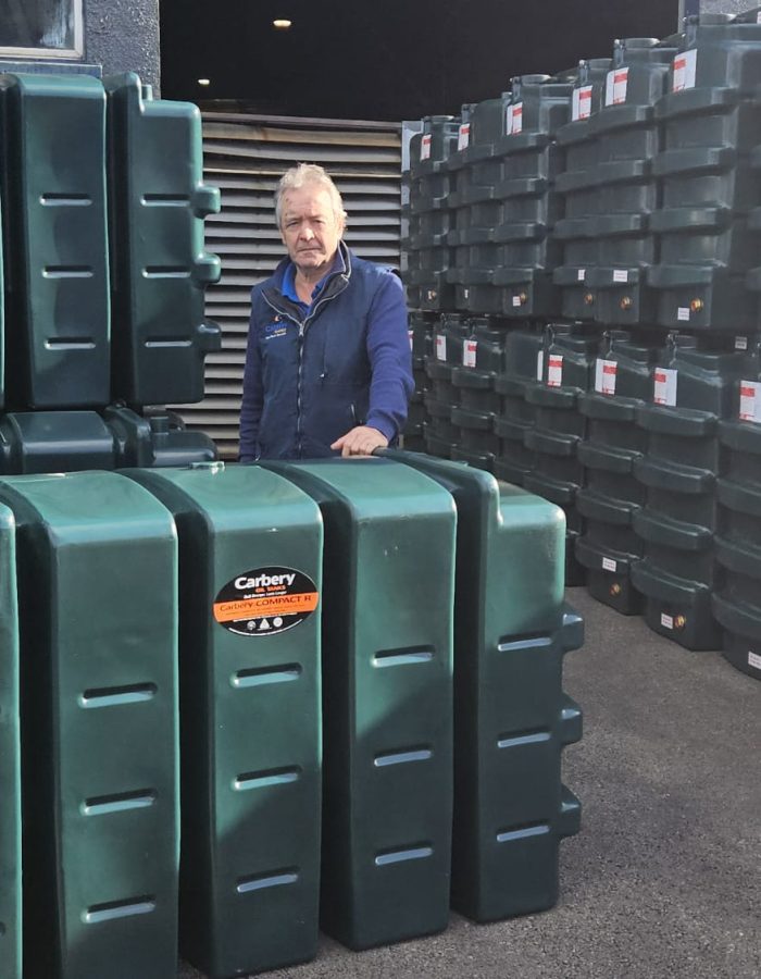 Jim Hunt with Carbery tank for 40th anniv.